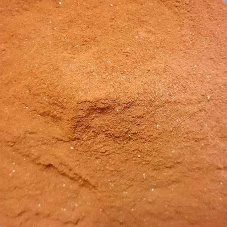 Detalle arcilla pura roja en polvo
