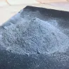 Montoncito de enlucido de acabado gris de arcilla